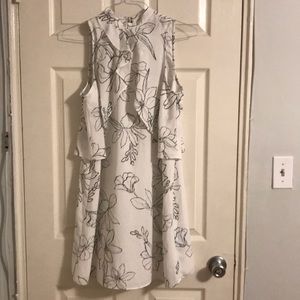 White dress with black flowers